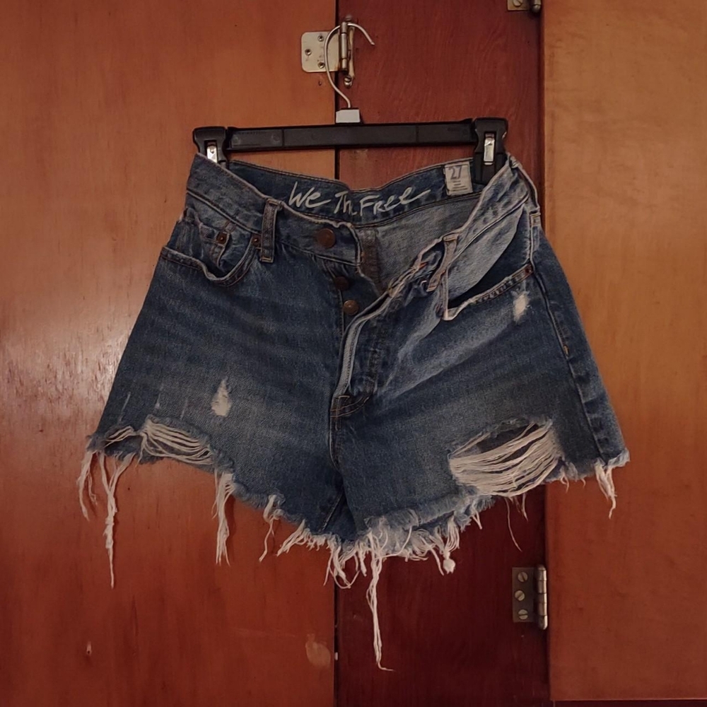 Mid Wash Mid Rise Button up blue jean denim short with shorn hems boyfriend